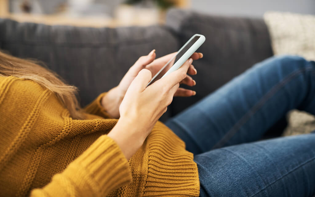 Woman checking her smart phone