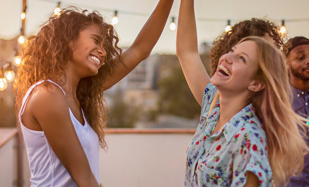 Women celebrating the Euromillions Superdraw