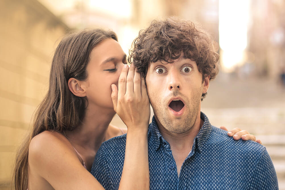 Can you win the lottery by cheating Woman whispering a secret into her boyfriend's ear