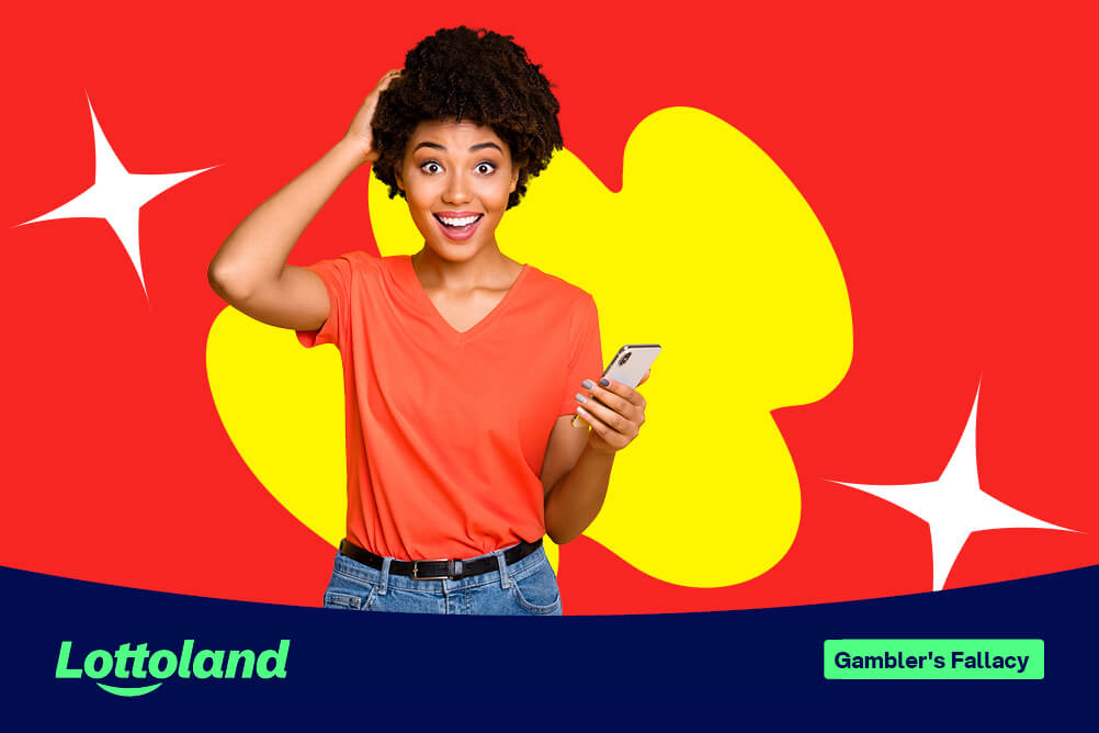 A woman, looking surprised having read about the gamblers fallacy on her phone