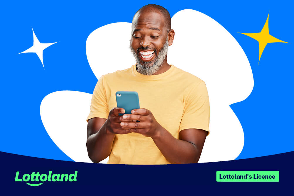 A man reading about Lottoland's licence on his phone, looking suitably impressed.
